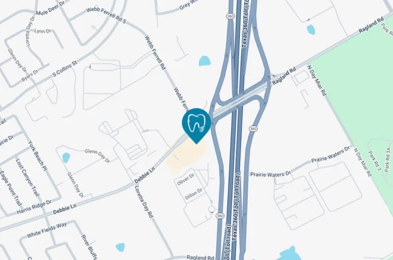 A map highlights a dental office location with a blue pin featuring a tooth icon, situated near the intersection of Debbie Lane and Webb Ferrell Road, close to Texas 360 Toll Road. Surrounding roads include Ragland Road, Oliver Drive, Dillon Drive, Glenn Day Drive, and Loretta Day Road, with various residential and commercial landmarks visible.